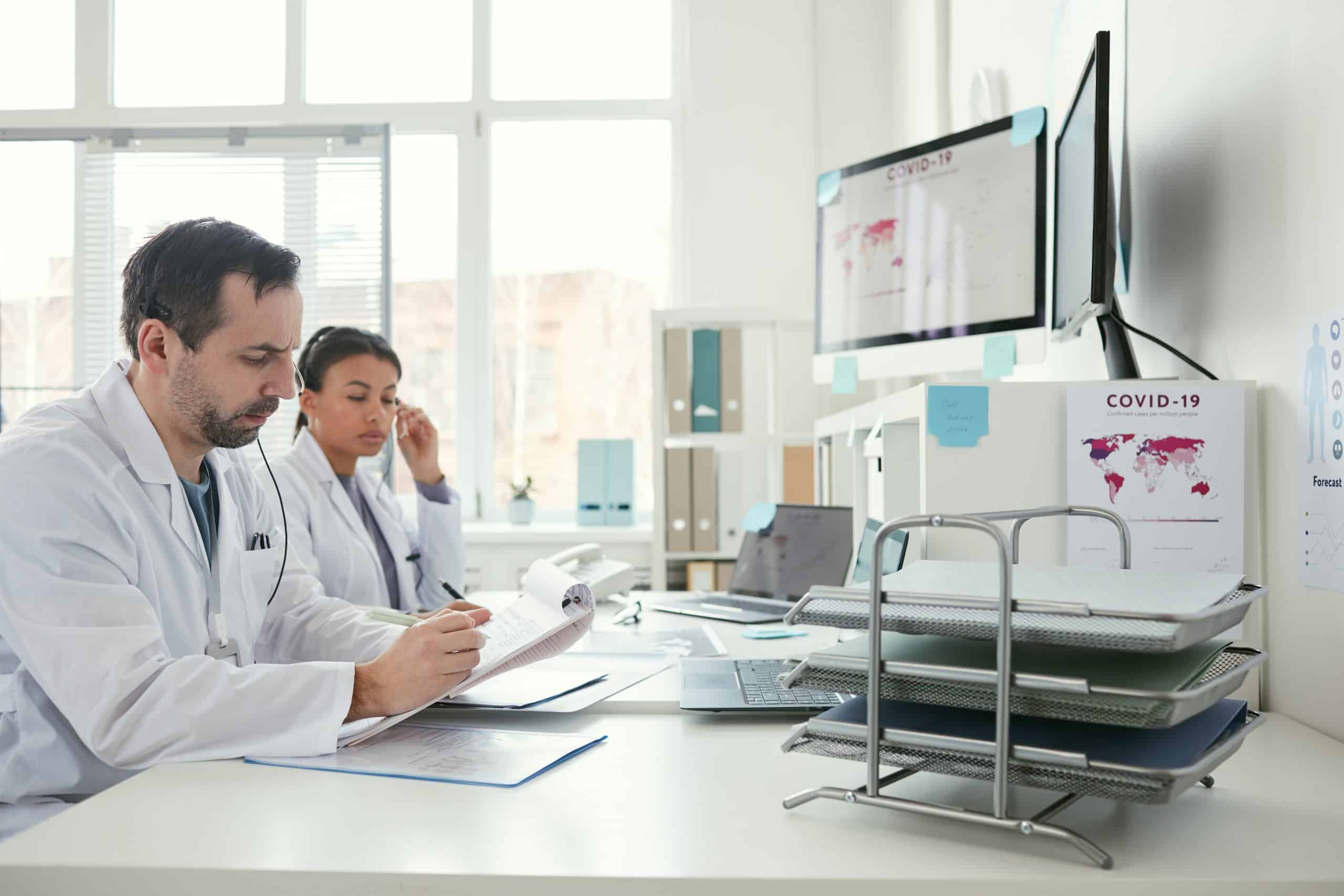 Doctors Working on Computers